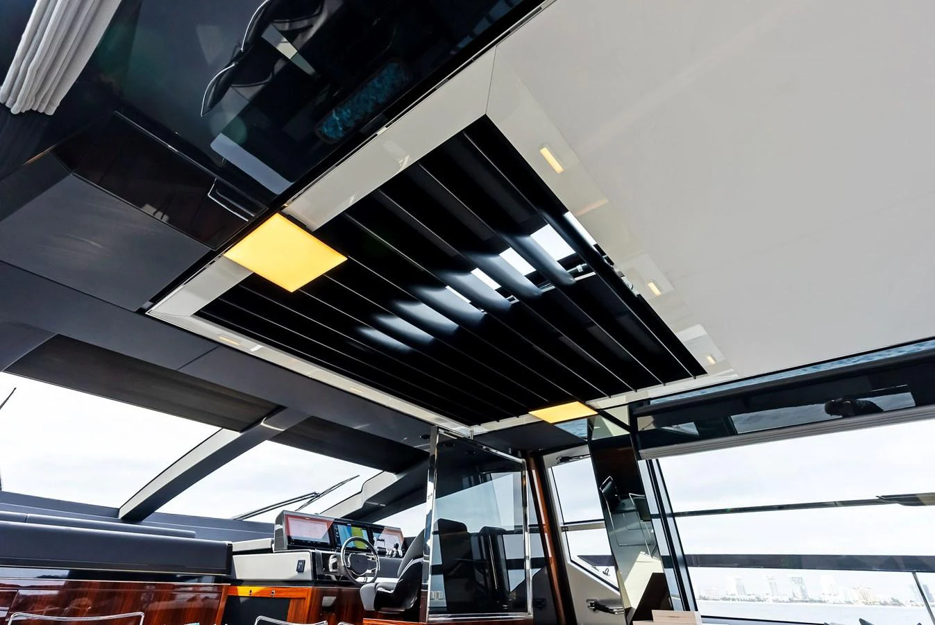 The helm station features a sleek, modern design with advanced navigation equipment and panoramic windows. aboard FERRETTI  TRADE Yacht for Sale