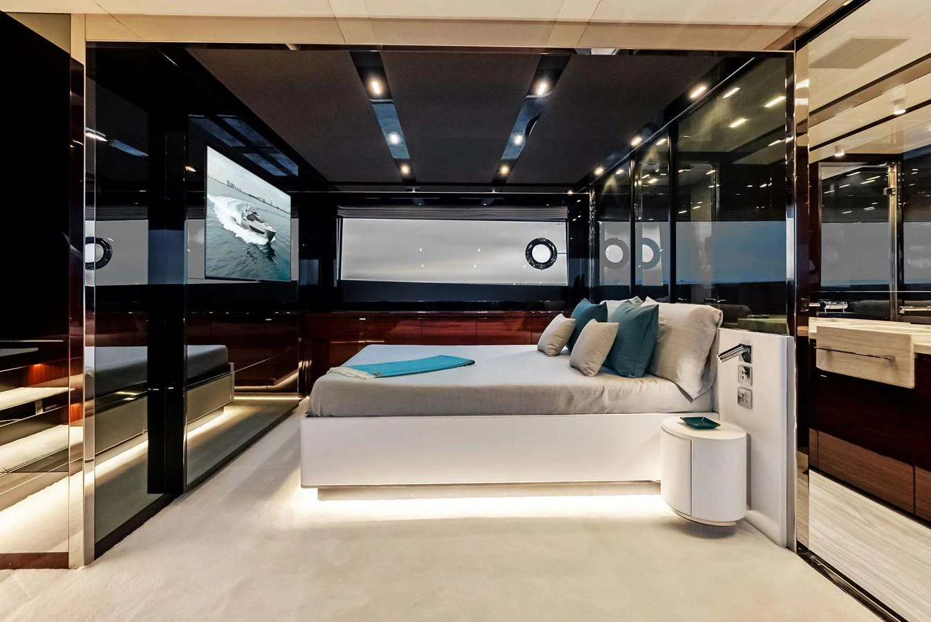 The master stateroom features a luxurious bed with modern decor and ample natural light. aboard FERRETTI  TRADE Yacht for Sale
