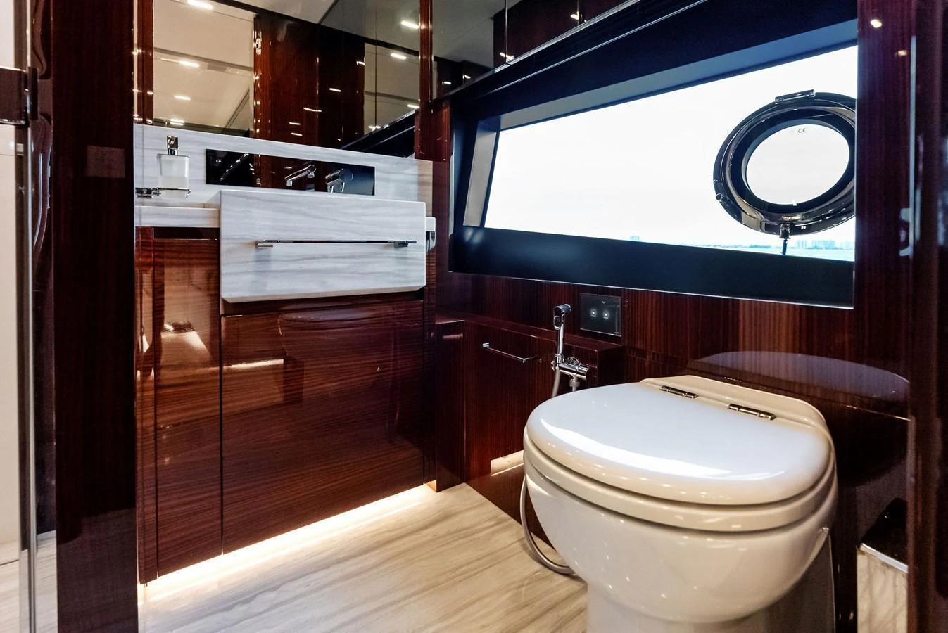 A luxurious yacht bathroom with modern fixtures and a sleek design. aboard FERRETTI  TRADE Yacht for Sale