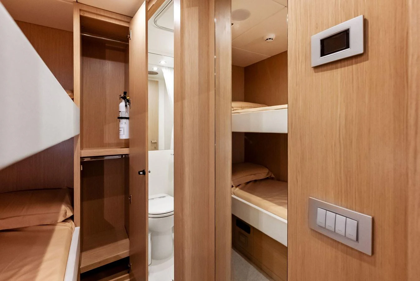 The crew quarters feature practical bunk beds and a compact bathroom for efficient use of space. aboard FERRETTI  TRADE Yacht for Sale