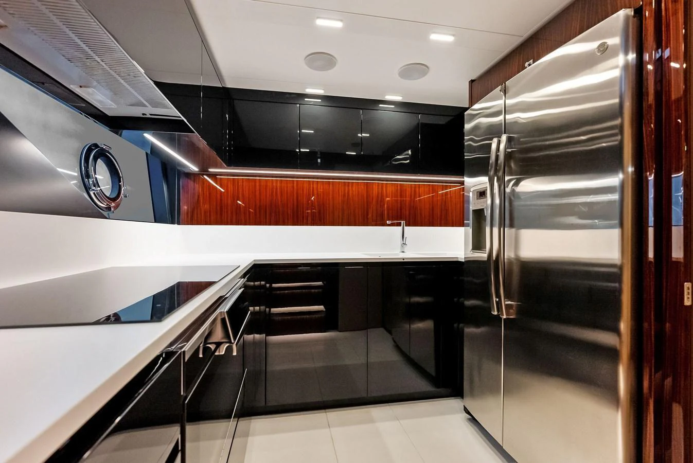 The yacht's galley features sleek modern design with high-end appliances and ample counter space. aboard FERRETTI  TRADE Yacht for Sale