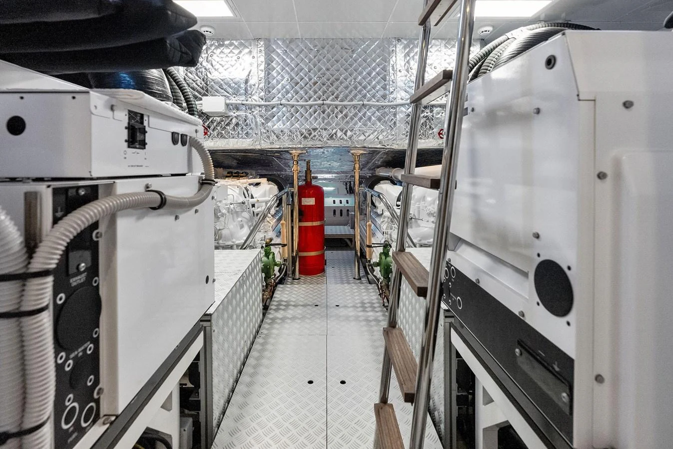 The image showcases the yacht's well-organized and meticulously maintained engine room. aboard FERRETTI  TRADE Yacht for Sale