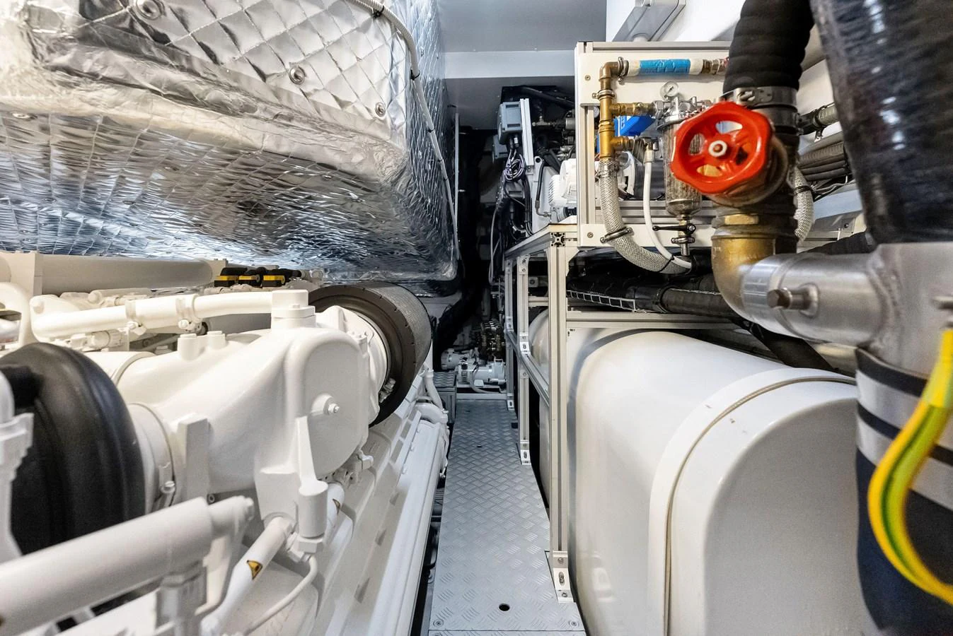 A meticulously organized engine room showcasing advanced mechanical systems and pristine maintenance. aboard FERRETTI  TRADE Yacht for Sale