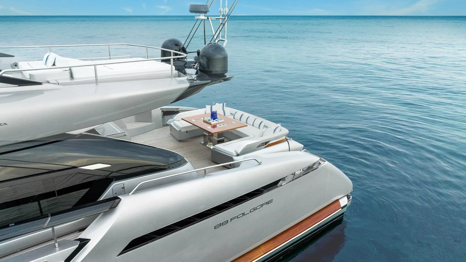 The yacht's aft deck features a stylish seating area with a table, perfect for enjoying the ocean views. aboard FERRETTI  TRADE Yacht for Sale