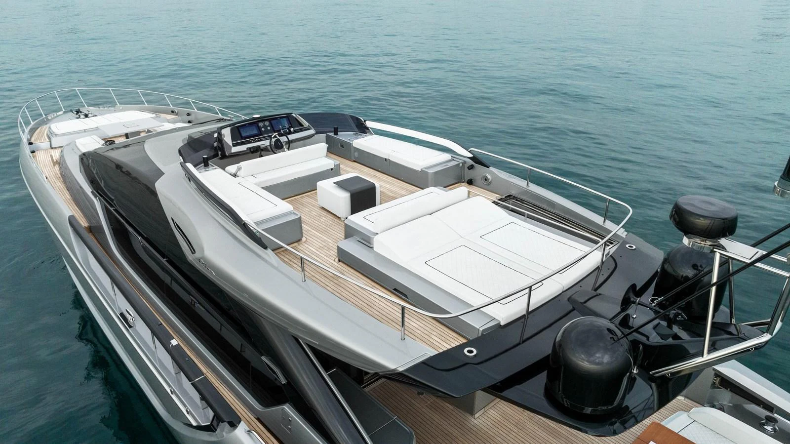 The yacht's flybridge offers a spacious and sleek design with ample seating and lounging areas. aboard FERRETTI  TRADE Yacht for Sale