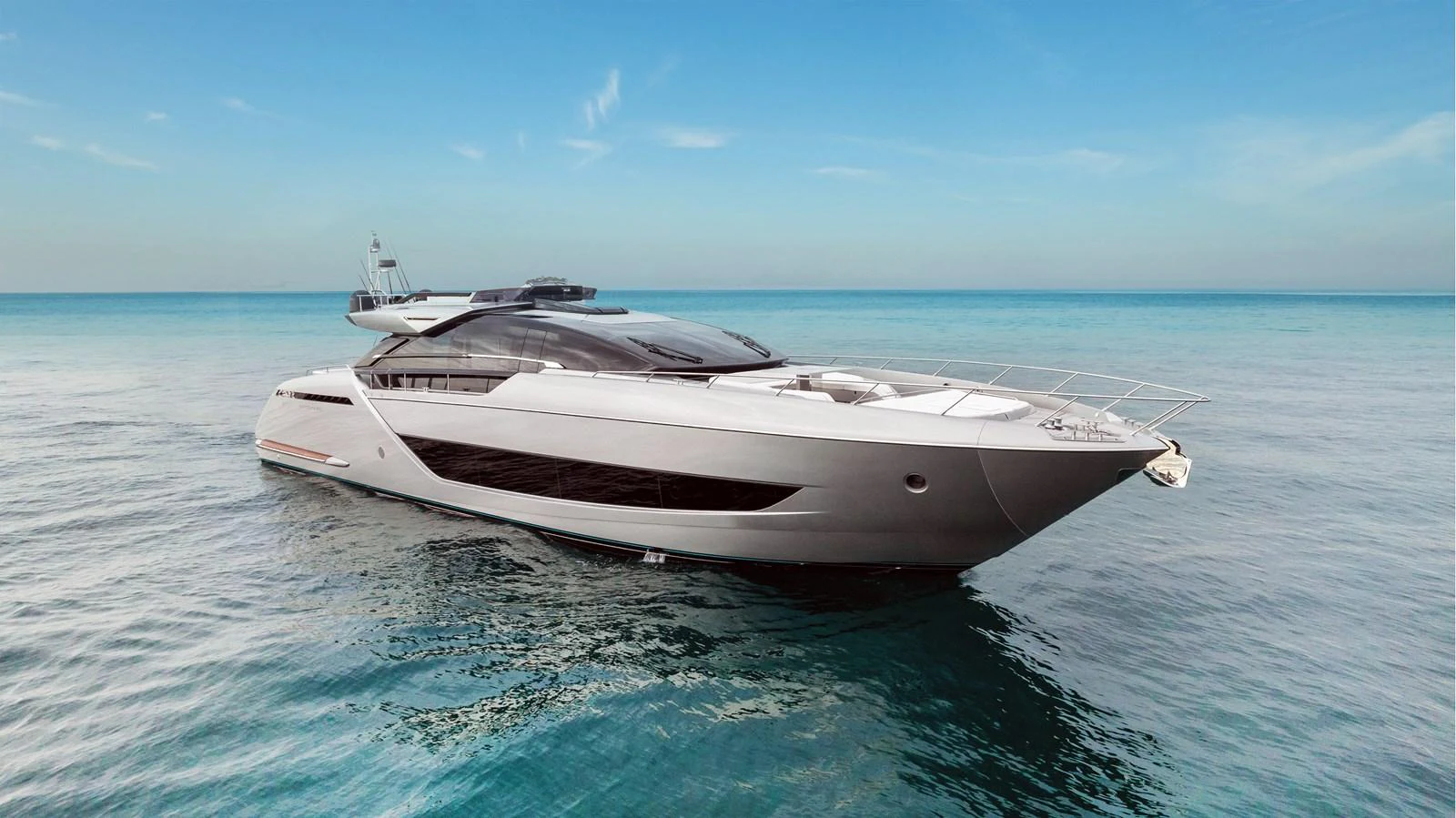 A sleek and modern yacht glides gracefully on calm blue waters under a clear sky. aboard FERRETTI  TRADE Yacht for Sale