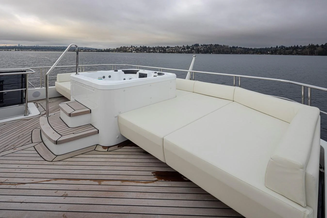 The sundeck features a luxurious jacuzzi and spacious sun loungers, perfect for relaxation. aboard STILL WATERS Yacht for Sale
