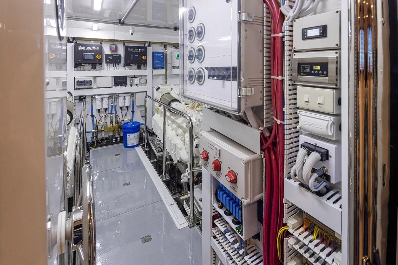 The engine room showcases advanced machinery and control systems, ensuring optimal performance and reliability. aboard STILL WATERS Yacht for Sale