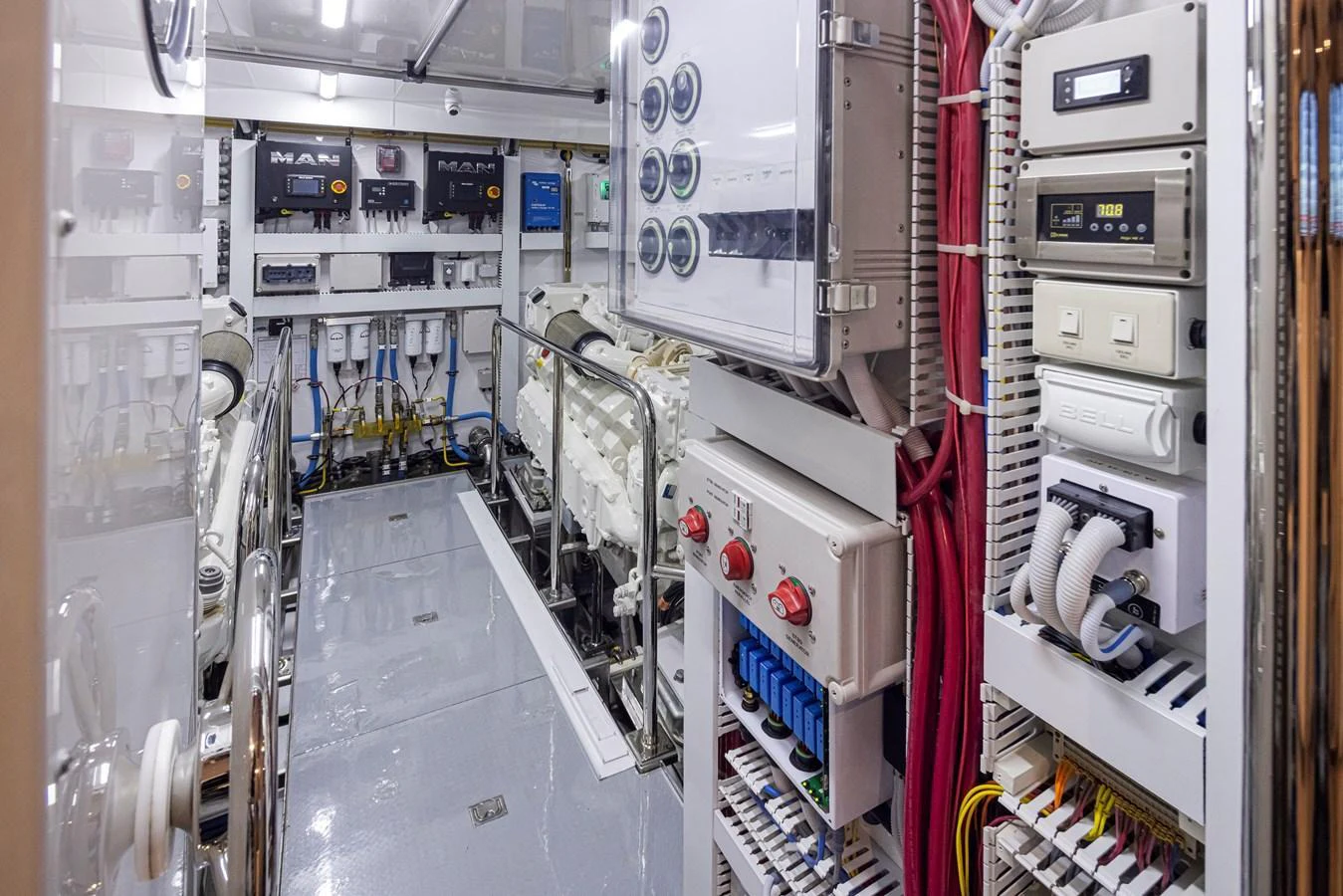 The engine room is equipped with advanced machinery and control panels, ensuring optimal performance and safety. aboard STILL WATERS Yacht for Sale