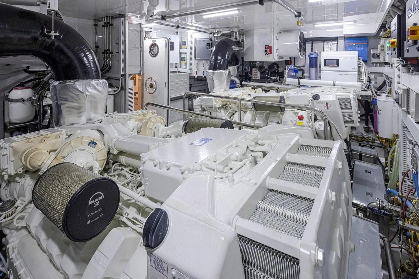 The engine room showcases the yacht's powerful and meticulously maintained machinery. aboard STILL WATERS Yacht for Sale