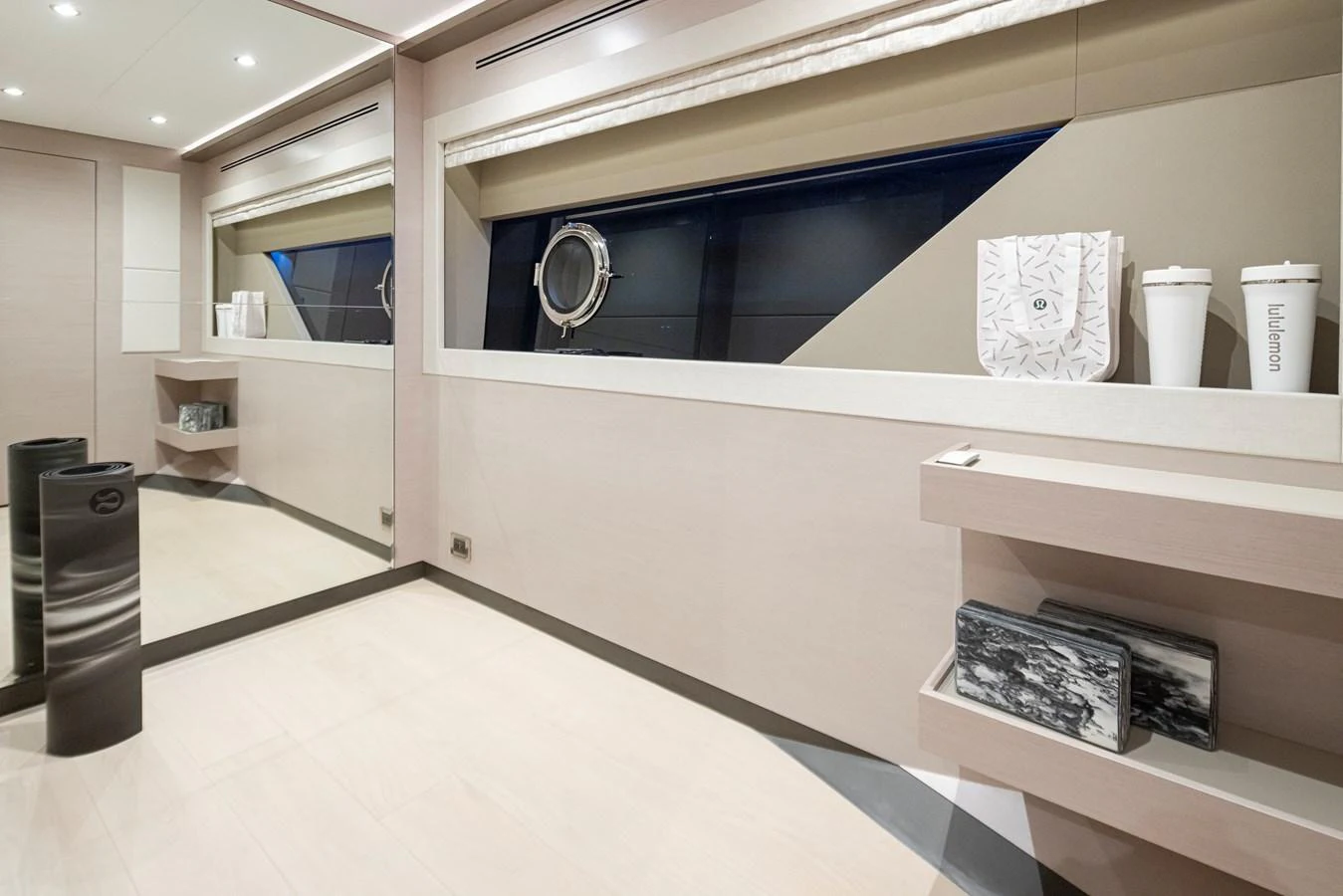A sleek and modern interior space with contemporary decor and ample storage. aboard STILL WATERS Yacht for Sale