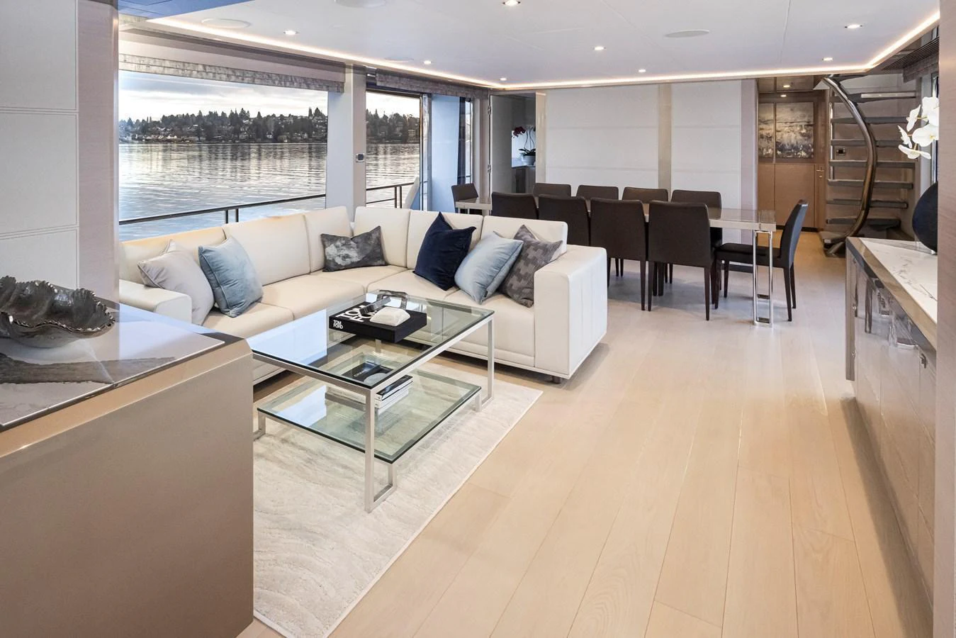 The salon offers a spacious and elegantly designed living area with panoramic views. aboard STILL WATERS Yacht for Sale
