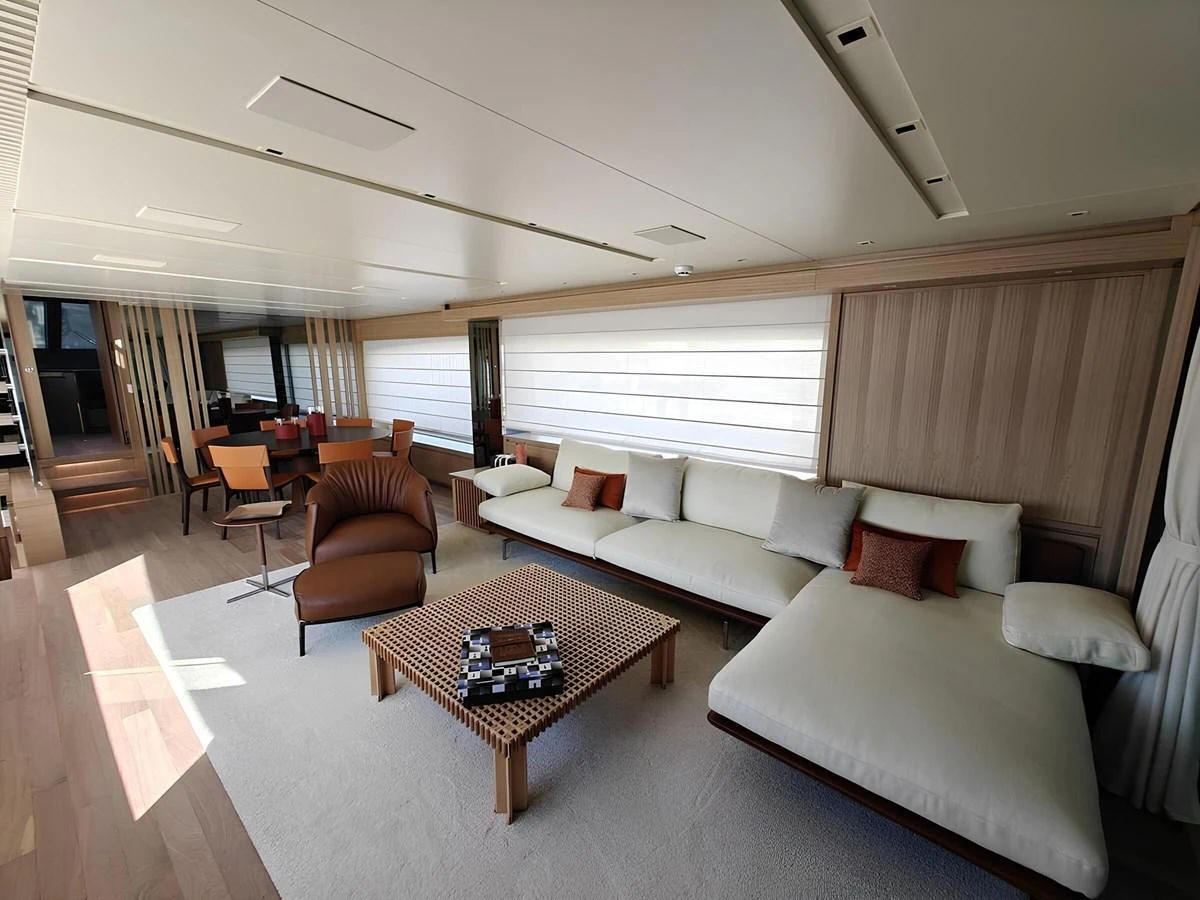 The yacht's salon features a spacious and modern seating area with elegant furnishings. aboard NADINKA Yacht for Sale
