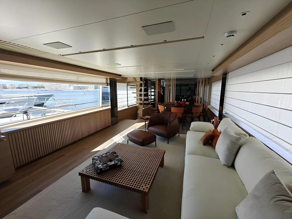 The spacious salon offers a luxurious and comfortable seating area with panoramic views. aboard NADINKA Yacht for Sale