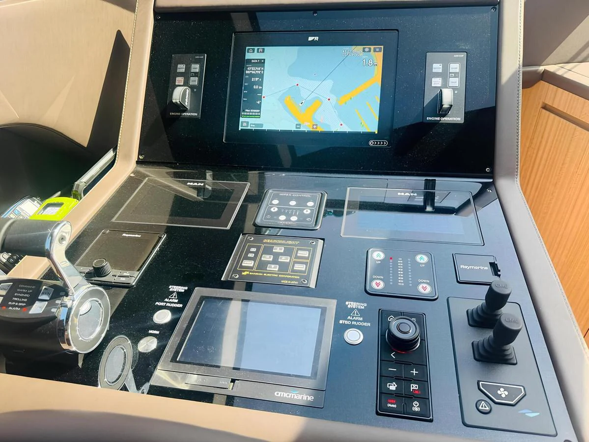 The helm features advanced navigation and control systems for a seamless sailing experience. aboard NADINKA Yacht for Sale