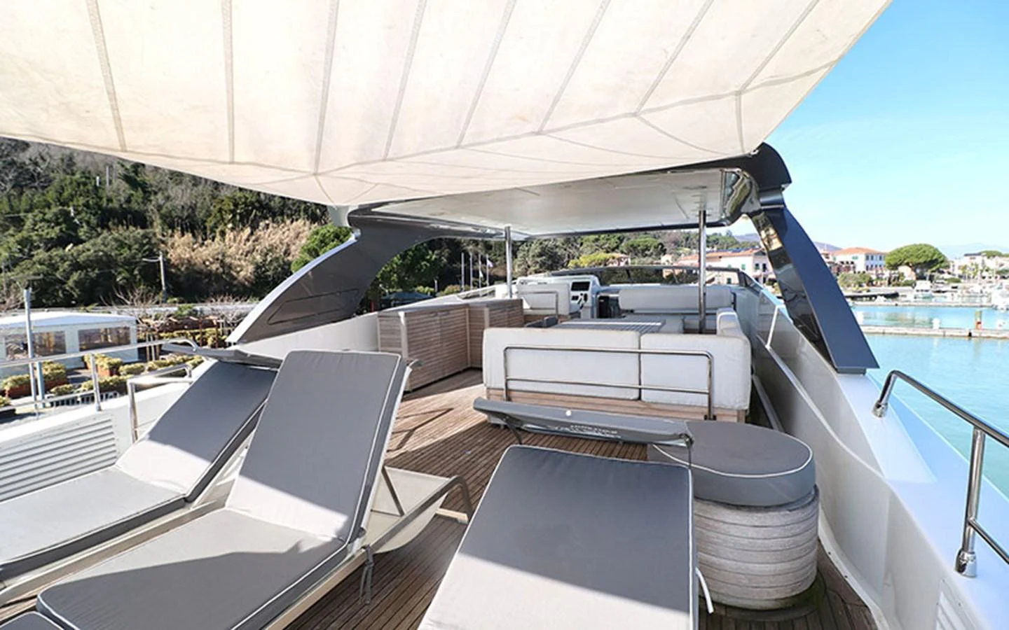 The flybridge offers a spacious and luxurious area for relaxation and entertainment, featuring comfortable seating and sun loungers. aboard MEP TOGETHER Yacht for Sale
