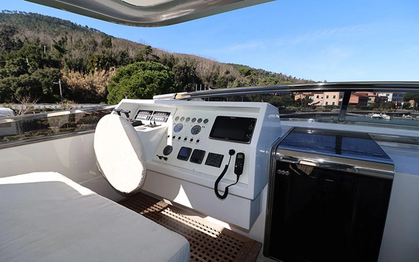 The helm station offers a sleek and modern control area with advanced navigation equipment. aboard MEP TOGETHER Yacht for Sale