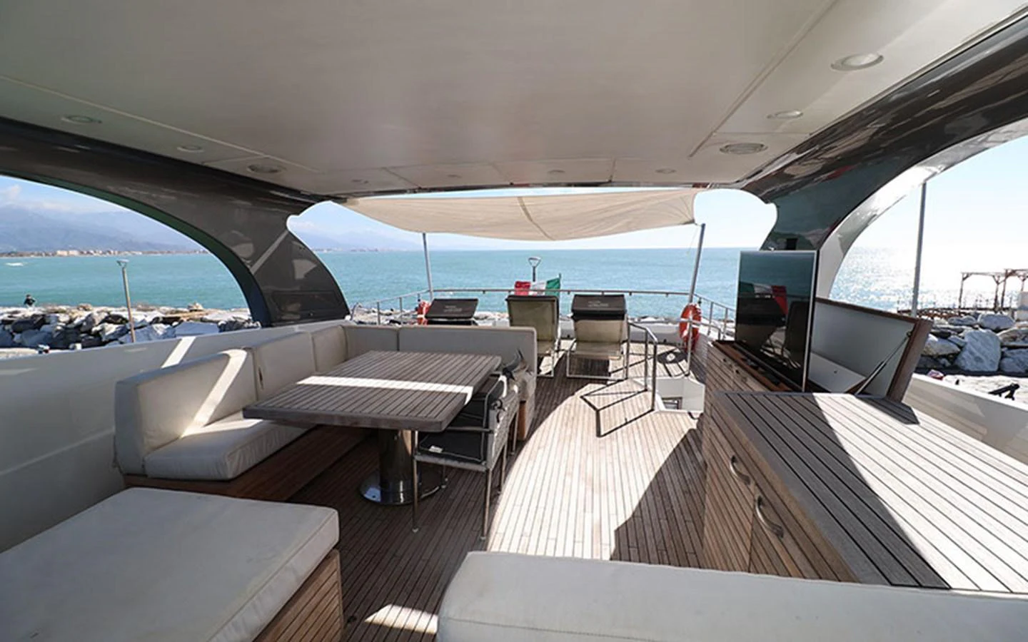 The aft deck offers a spacious and comfortable area for relaxation and dining with stunning sea views. aboard MEP TOGETHER Yacht for Sale
