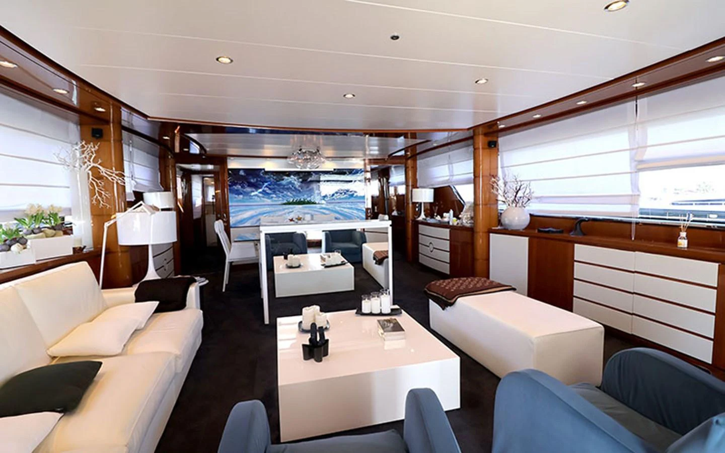 The yacht's salon features a spacious and elegant seating area with modern furnishings and ample natural light. aboard MEP TOGETHER Yacht for Sale