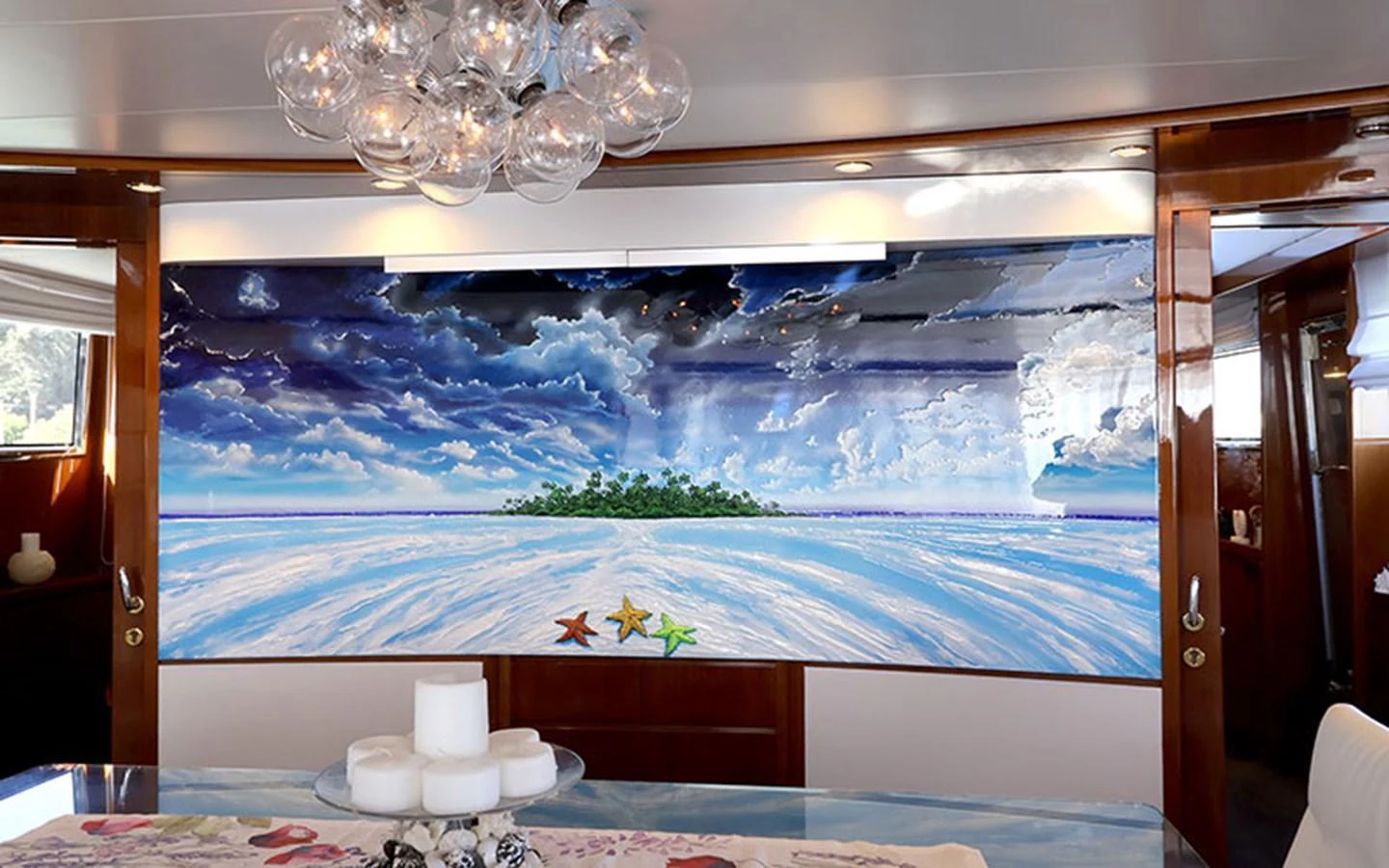 The interior features a striking wall mural of a seascape, adding an artistic touch to the yacht's decor. aboard MEP TOGETHER Yacht for Sale