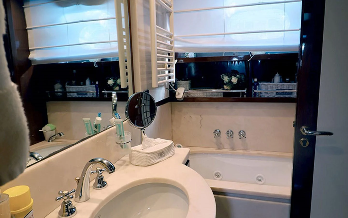 The yacht's bathroom features a sleek design with modern fixtures and a luxurious bathtub. aboard MEP TOGETHER Yacht for Sale