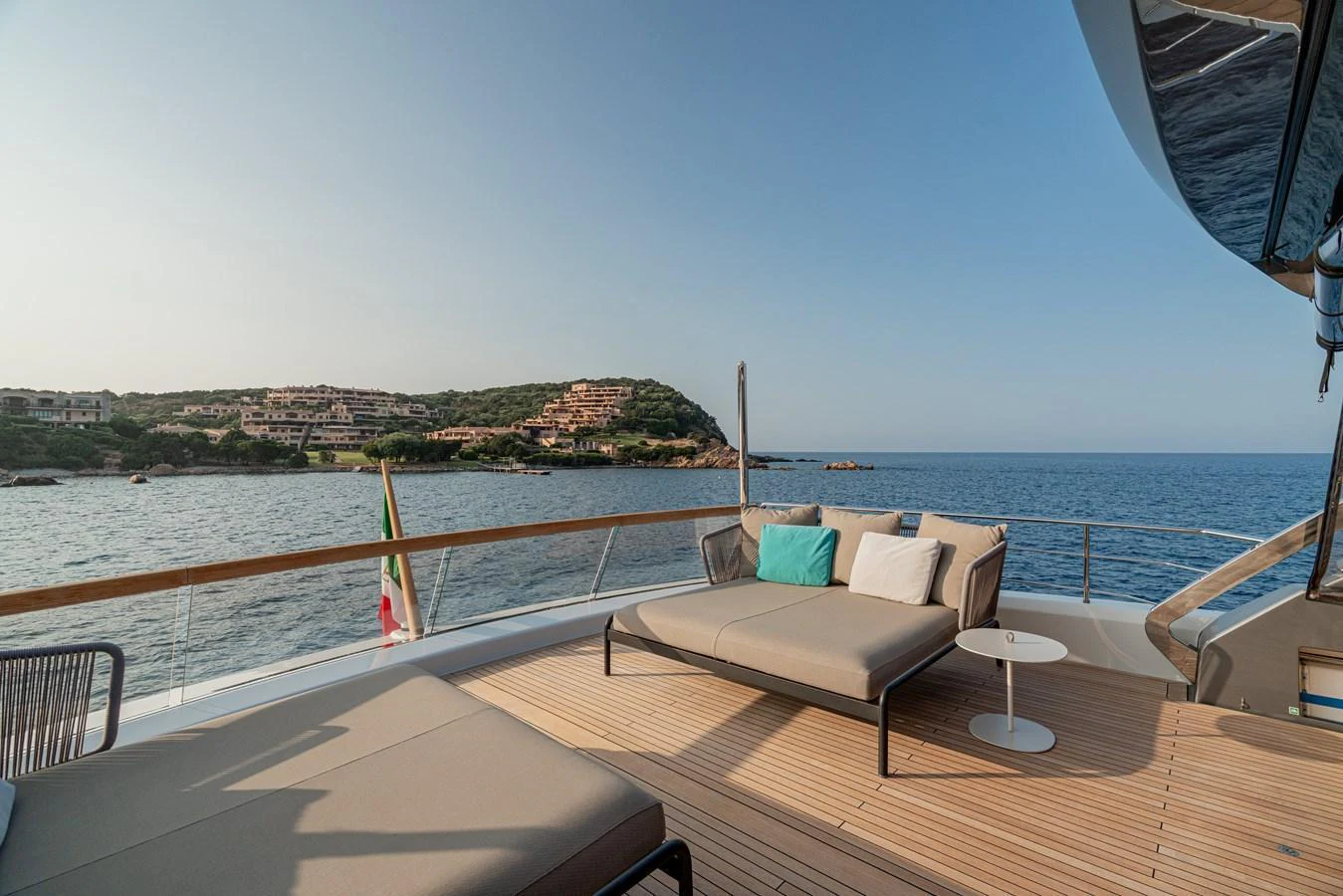 The aft deck offers a serene lounging area with stunning sea views and comfortable sunbeds. aboard SANLORENZO SX 88 M&M Yacht for Sale