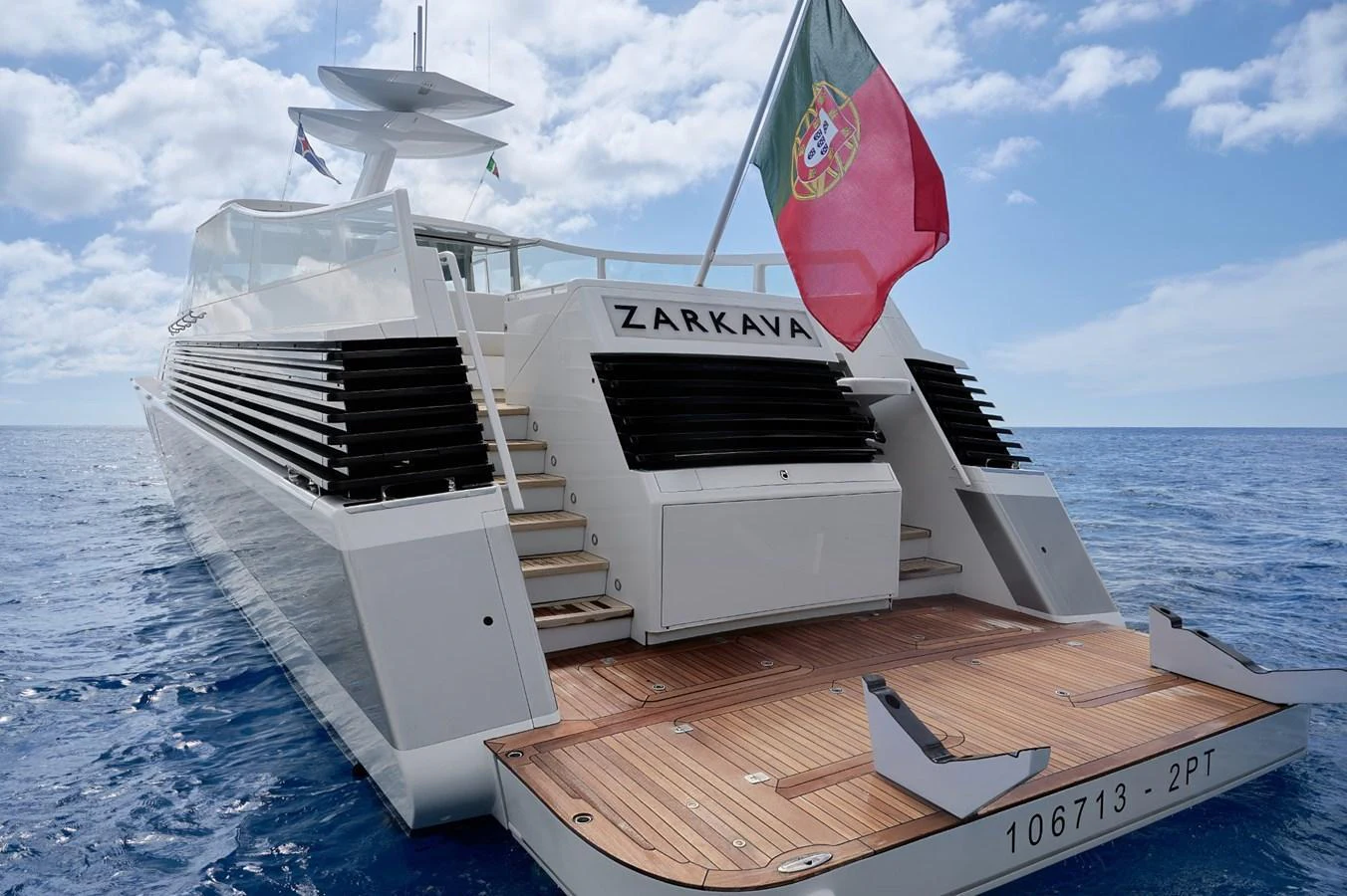 The yacht's aft deck features a spacious swim platform with elegant teak decking, perfect for relaxing by the water. aboard ZARKAVA Yacht for Sale