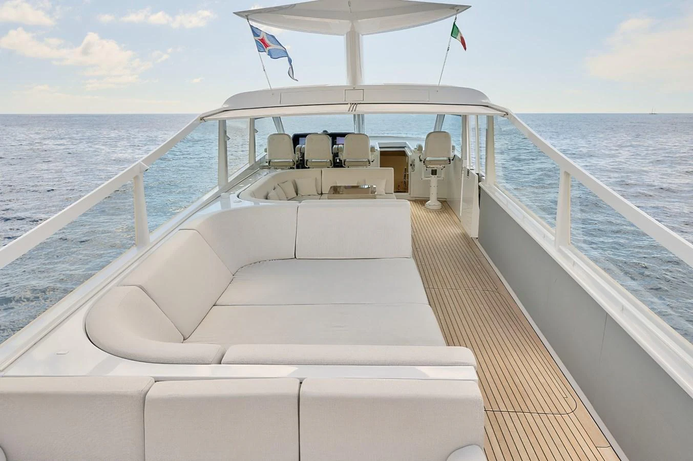 The flybridge offers a spacious and comfortable seating area with panoramic ocean views. aboard ZARKAVA Yacht for Sale