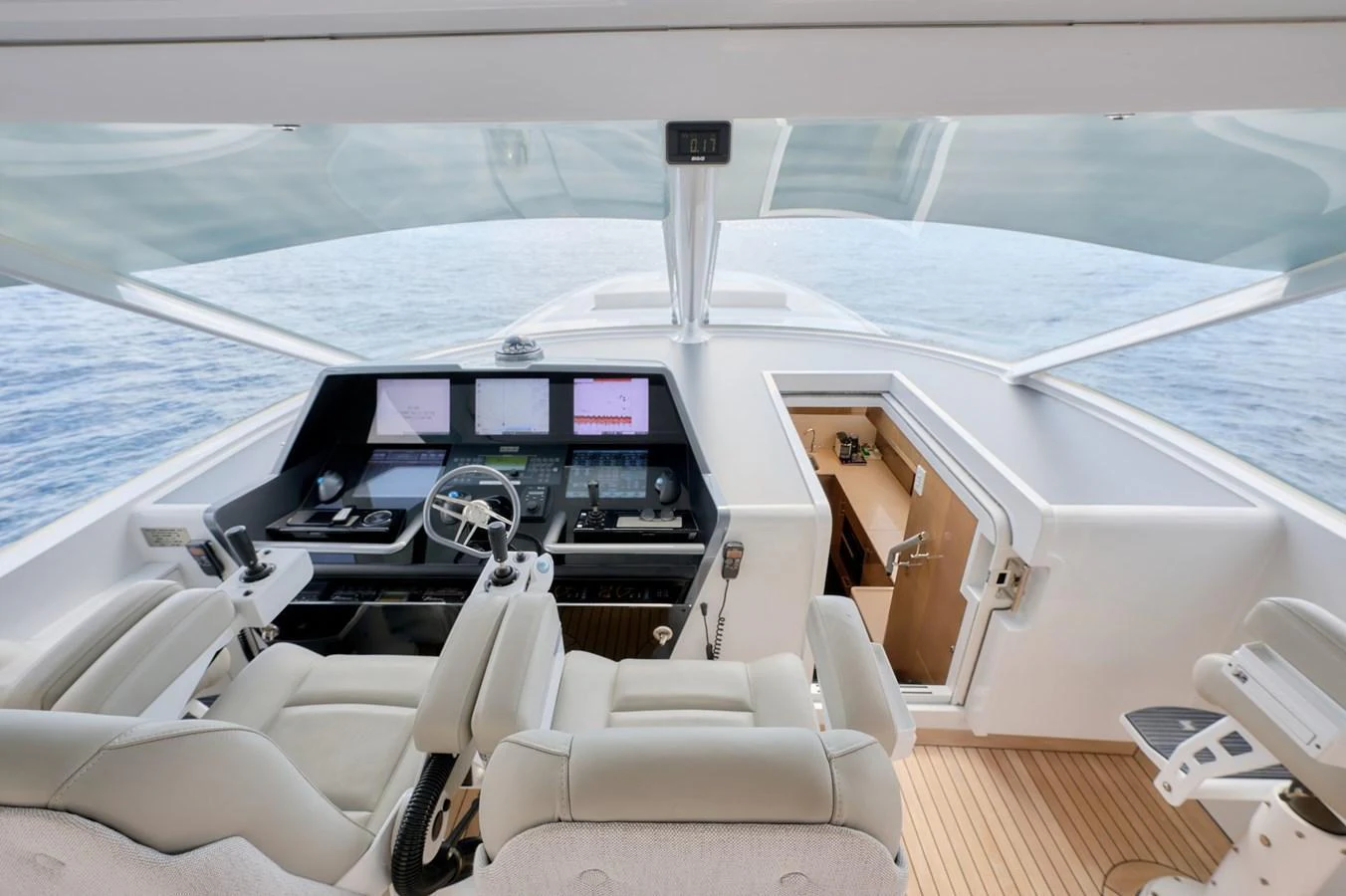 The helm station offers a modern and sophisticated control area with panoramic views. aboard ZARKAVA Yacht for Sale