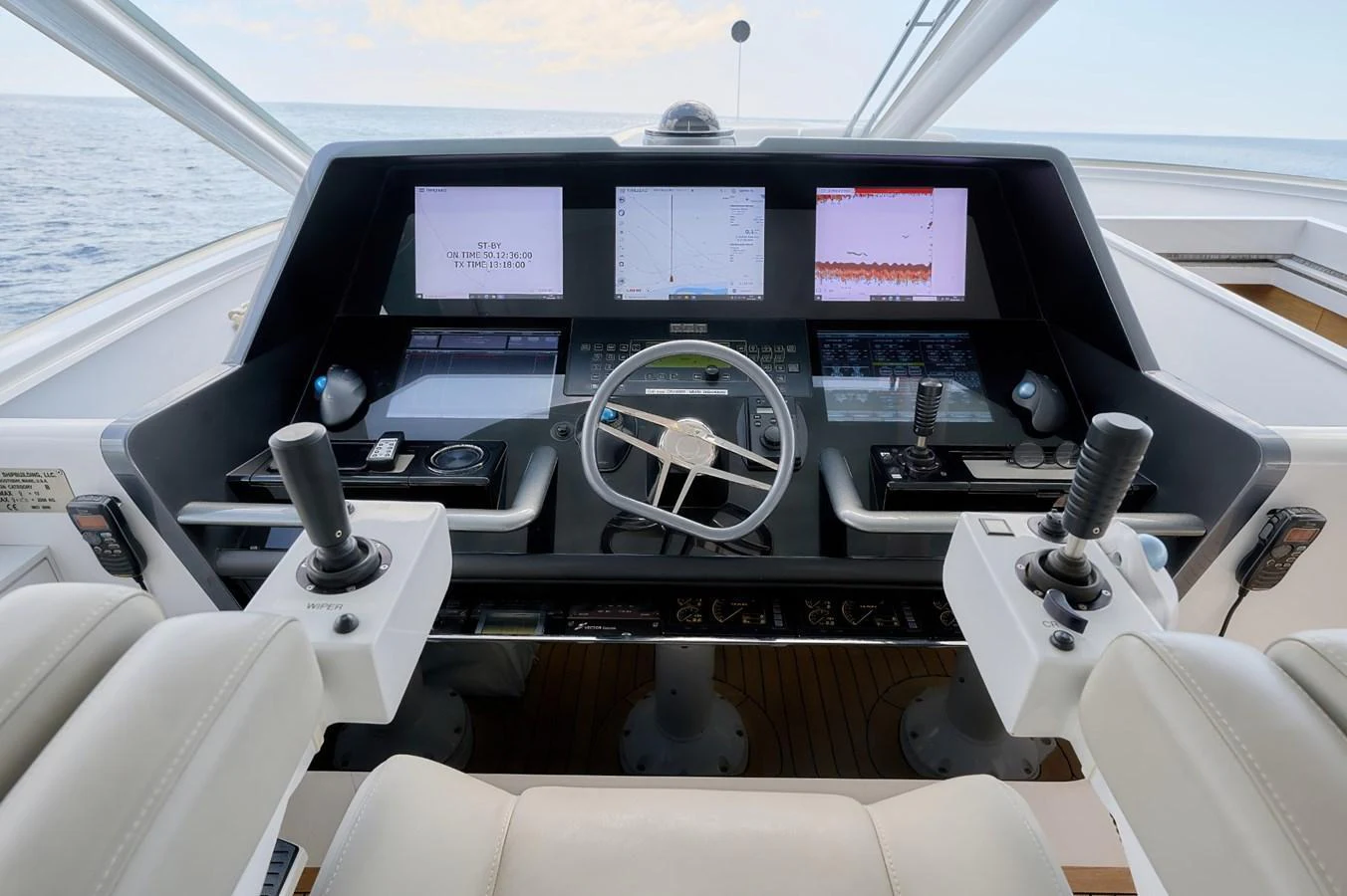 The helm features advanced navigation equipment and comfortable seating for the captain. aboard ZARKAVA Yacht for Sale