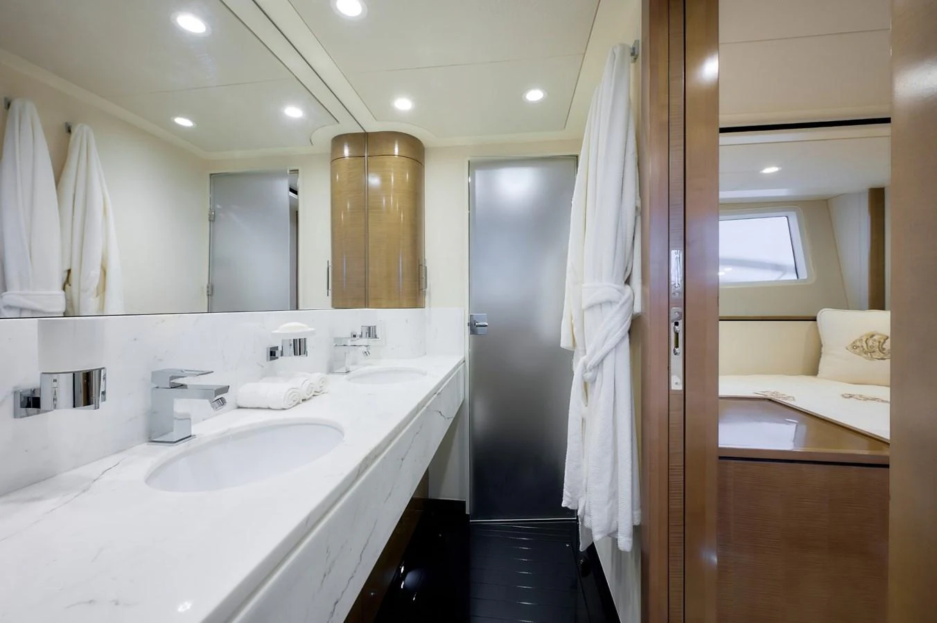 The yacht's bathroom features a sleek design with a marble countertop and modern fixtures. aboard ZARKAVA Yacht for Sale