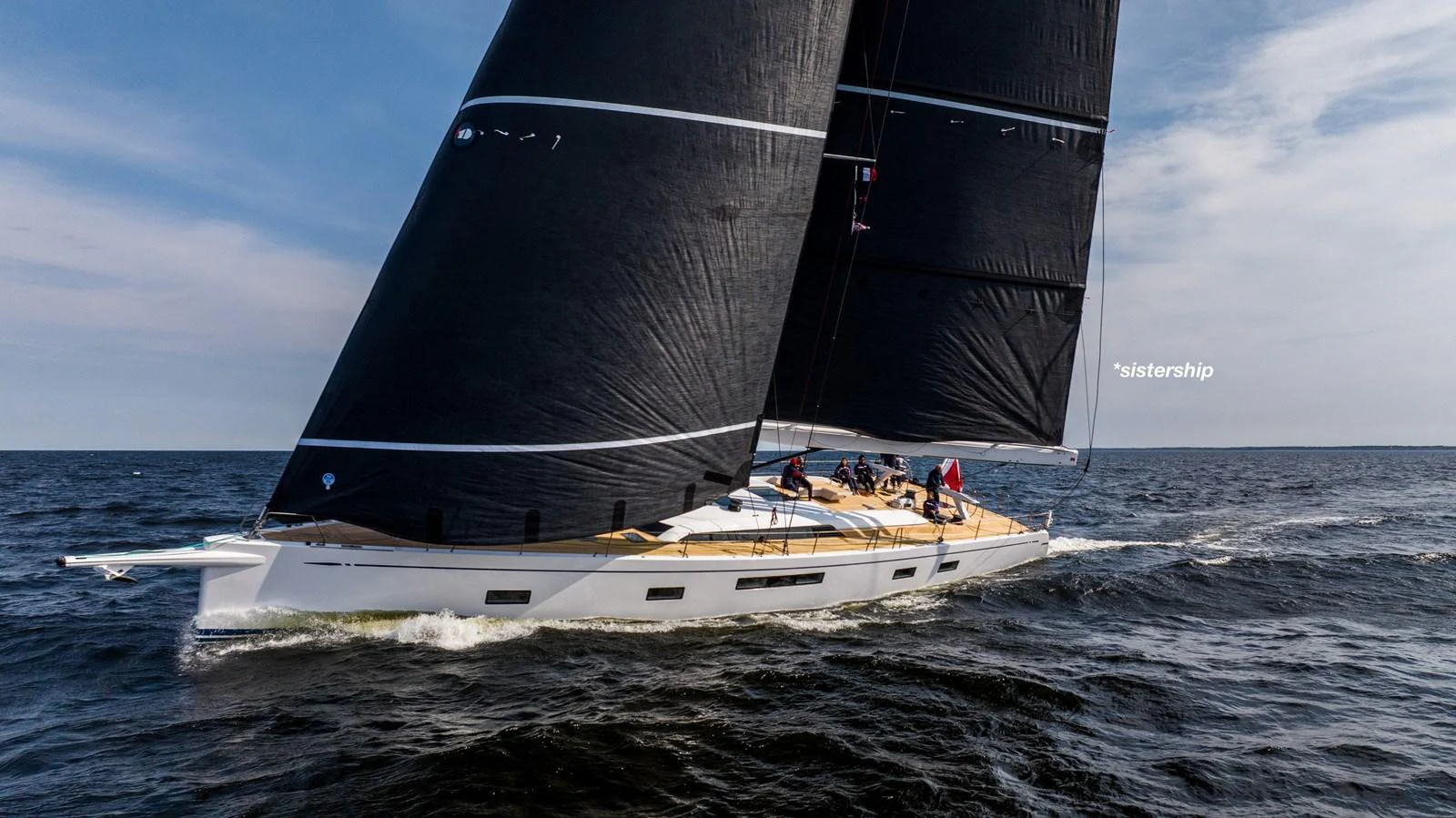 A sleek sailing yacht glides gracefully over the water with its sails fully extended. aboard TO BE DECIDED Yacht for Sale