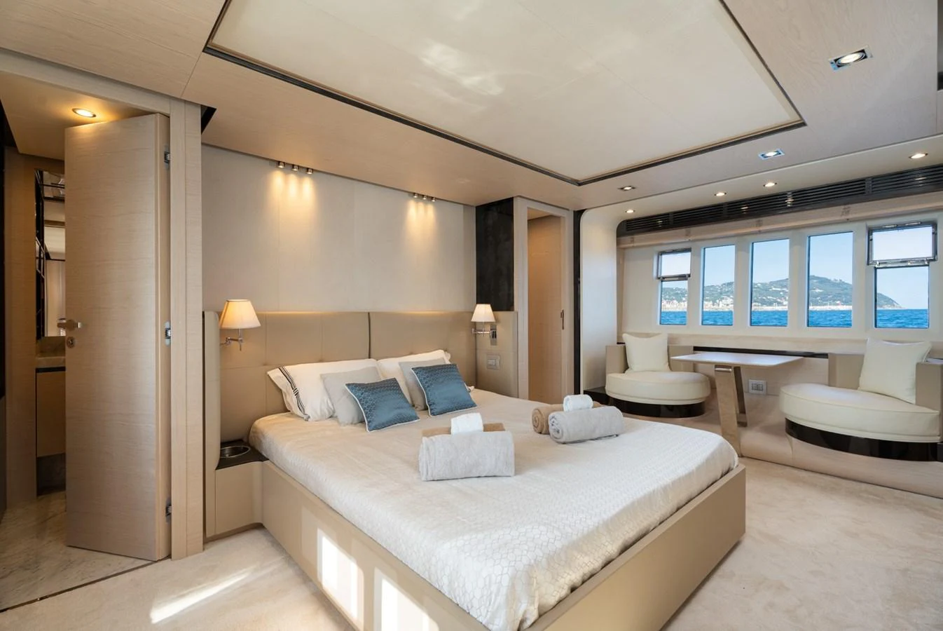 The master stateroom offers a spacious and luxurious retreat with large windows providing stunning sea views. aboard TRINIDAD Yacht for Sale