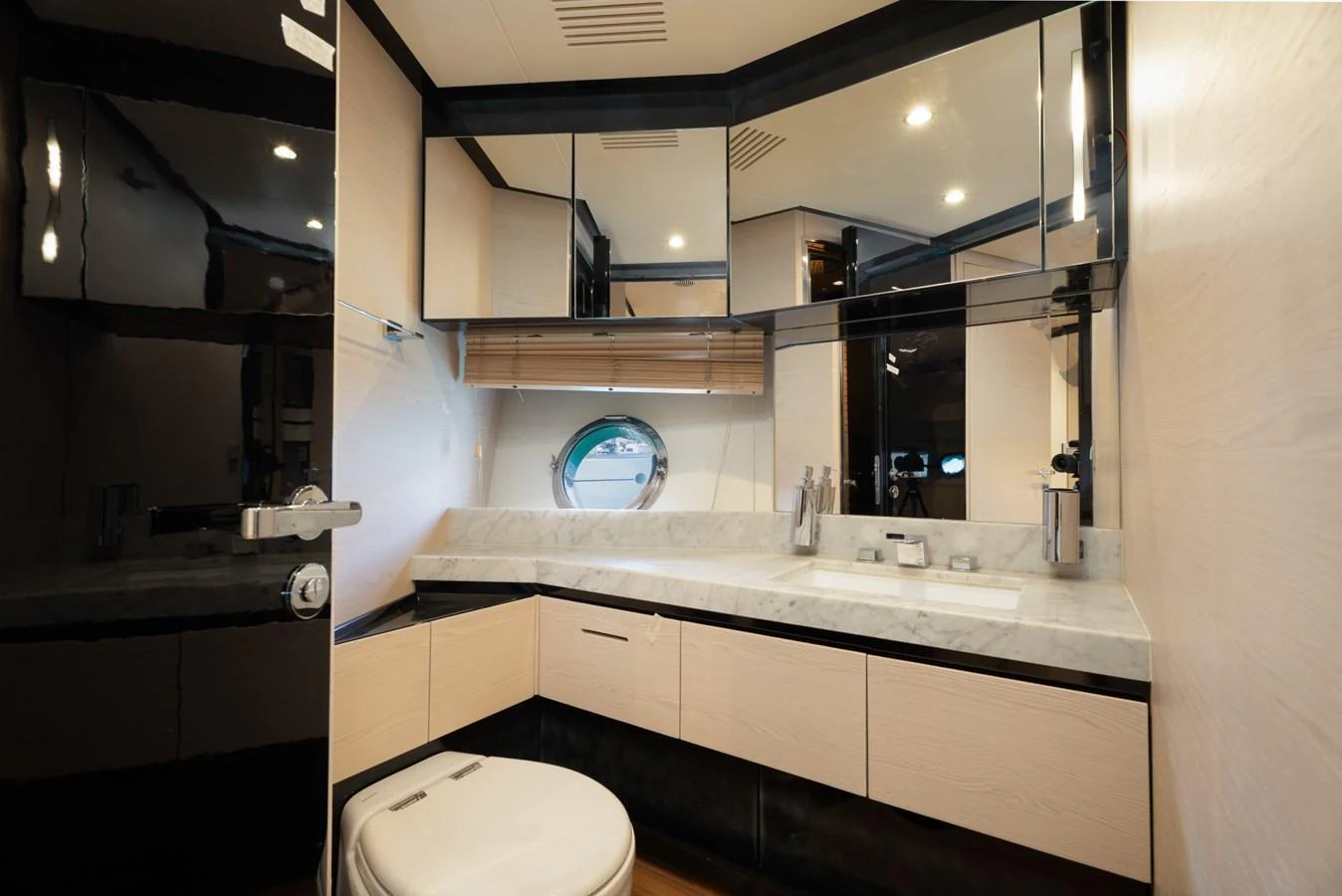 The yacht's bathroom features modern fixtures and a sleek design. aboard TRINIDAD Yacht for Sale