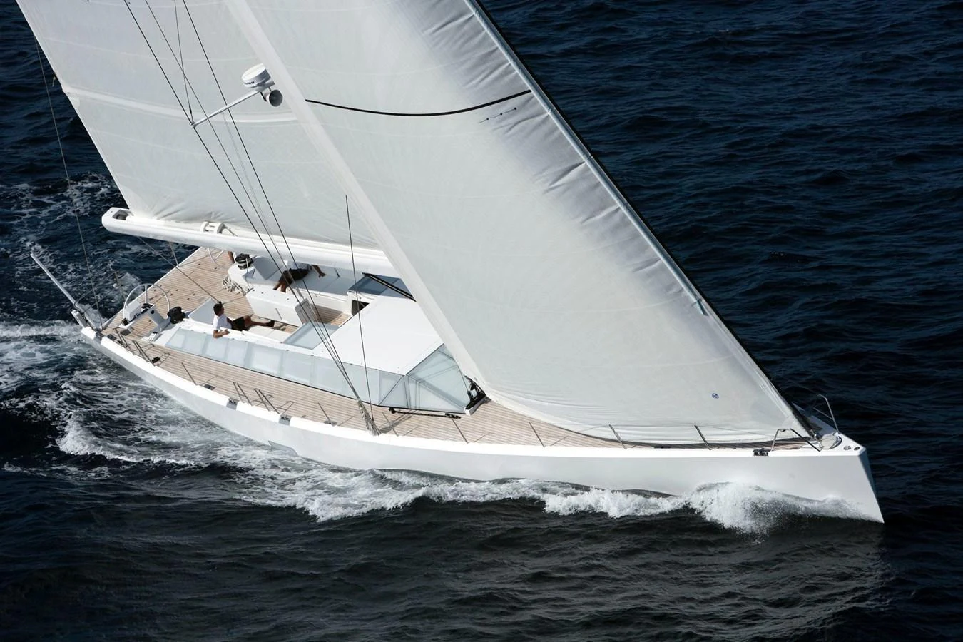 A sleek sailing yacht glides gracefully over the water with its sails fully extended. aboard POLYTROPON II Yacht for Sale