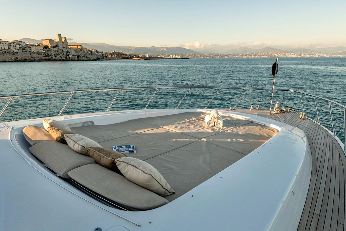 The sundeck offers a luxurious lounging area with plush cushions and stunning sea views. aboard K GRACE Yacht for Sale