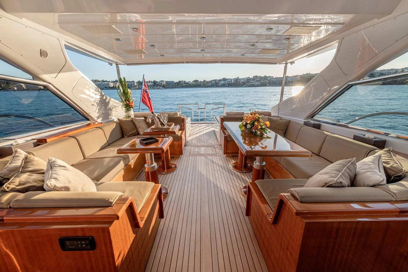 The aft deck offers a spacious and elegant seating area with a stunning view of the water. aboard K GRACE Yacht for Sale