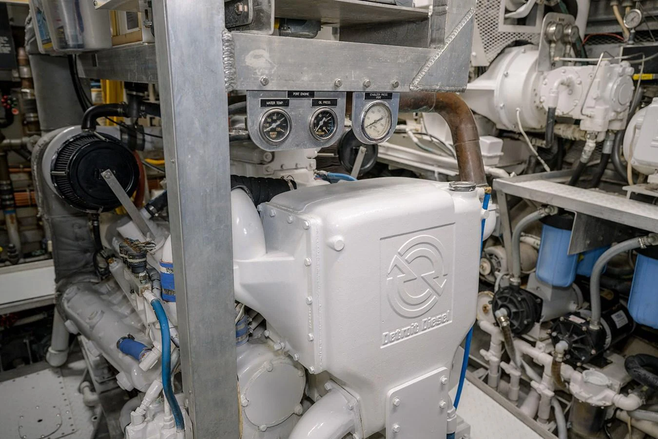 The image showcases the well-maintained engine room of the yacht, highlighting its mechanical components. aboard MAMA BEAR Yacht for Sale