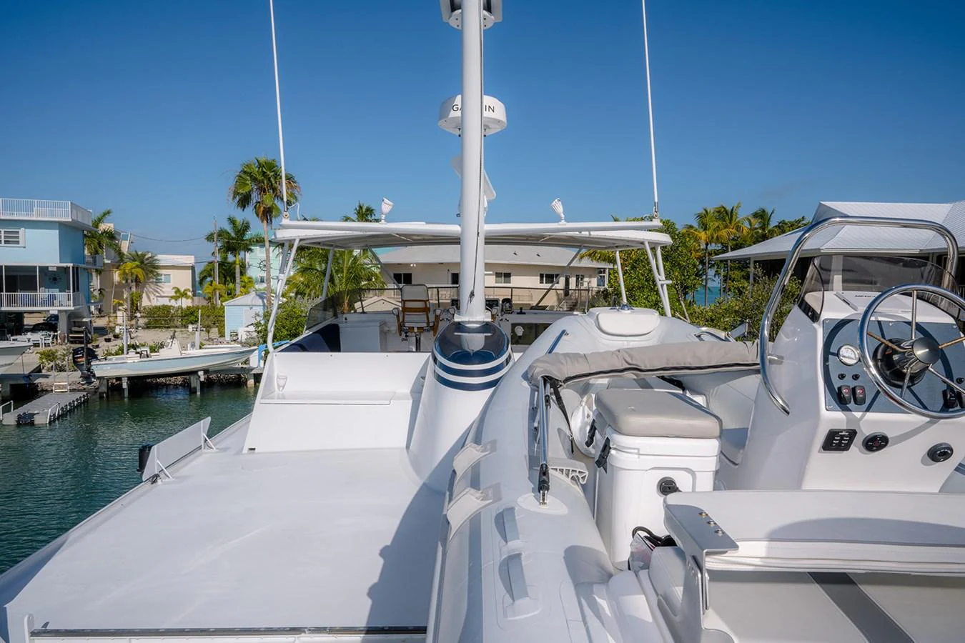 The flybridge offers a spacious and inviting area for relaxation and navigation. aboard MAMA BEAR Yacht for Sale