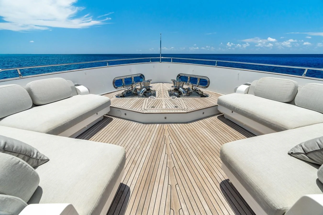 The foredeck features spacious sun loungers with a stunning ocean view. aboard LIFE Yacht for Sale
