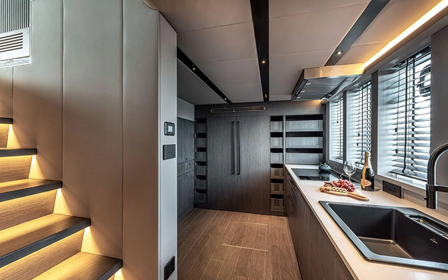 The galley features modern design with sleek cabinetry and ample counter space. aboard SITARA Yacht for Sale