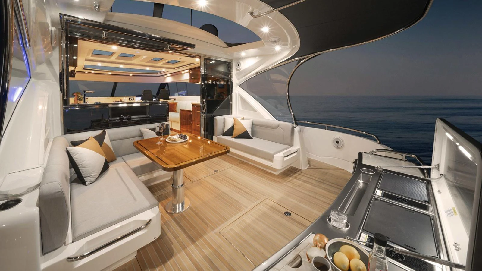 a room with a couch and a table aboard 6800 SPORT YACHT Yacht for Sale