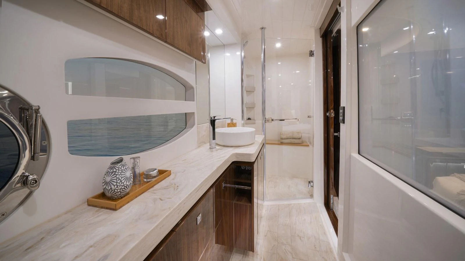 a bathroom with a large mirror aboard 6800 SPORT YACHT Yacht for Sale