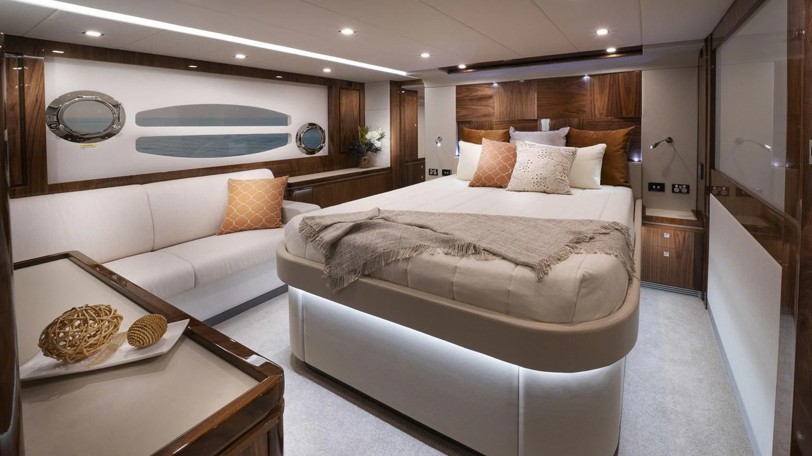 a room with a bed and a table aboard 6800 SPORT YACHT Yacht for Sale
