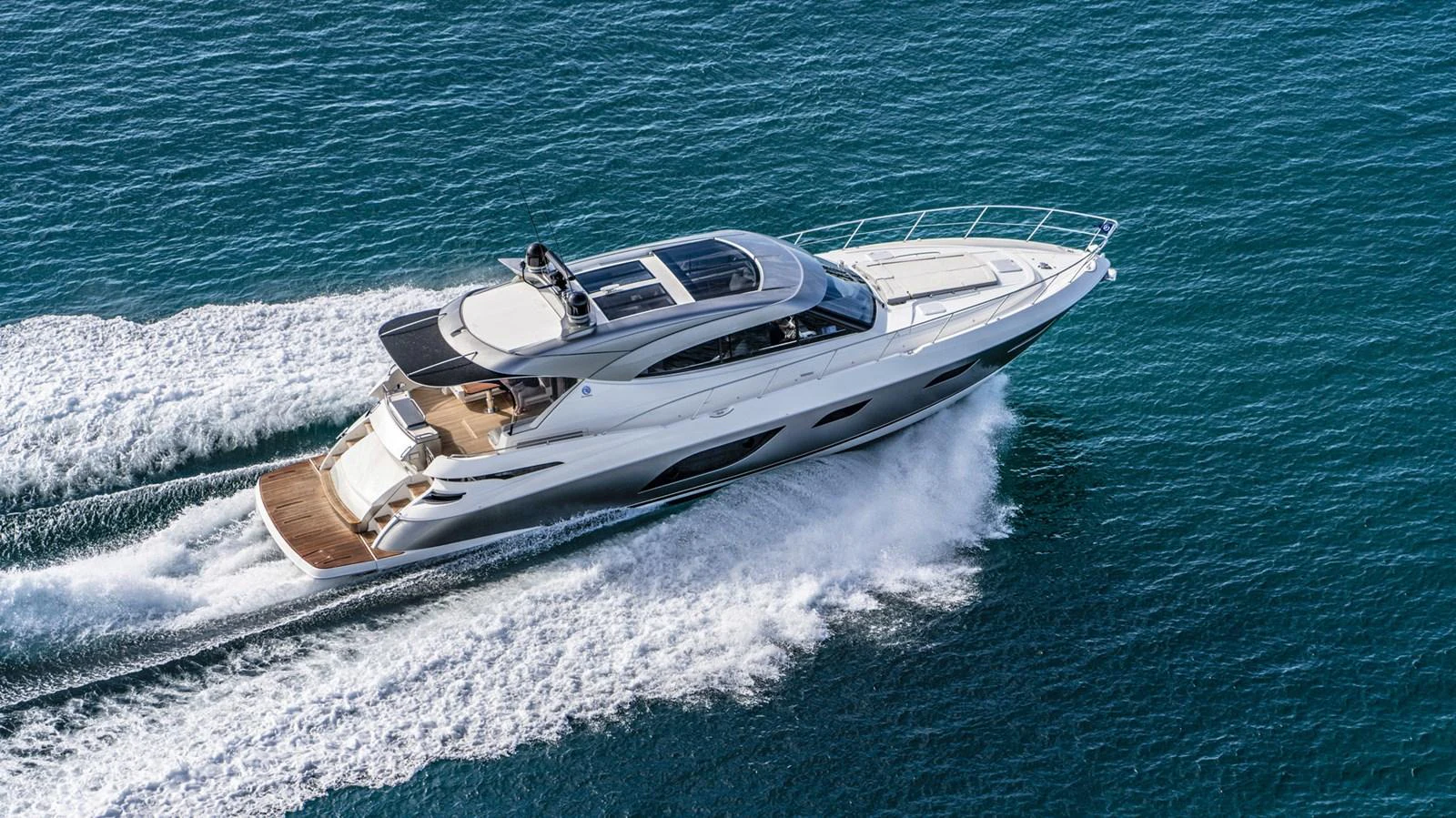a boat on the water aboard 6800 SPORT YACHT Yacht for Sale