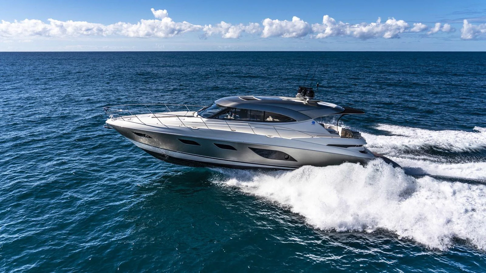 a boat on the water aboard 6800 SPORT YACHT Yacht for Sale