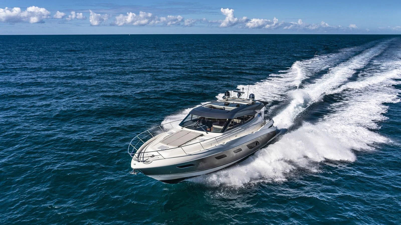 a boat on the water aboard 6800 SPORT YACHT Yacht for Sale