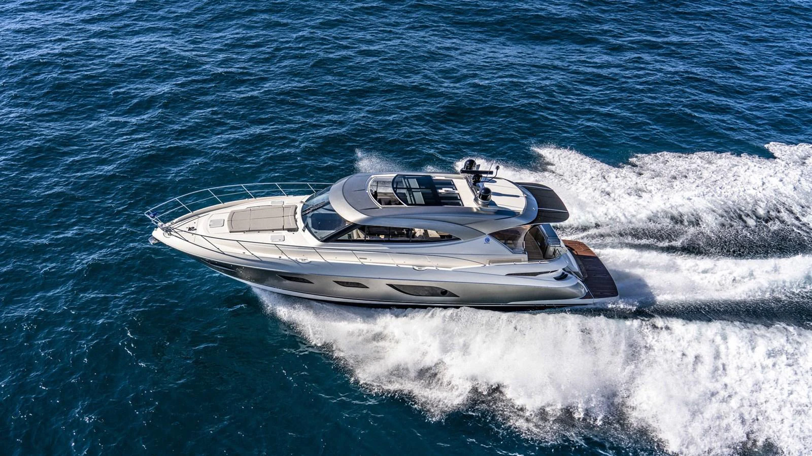 a boat on the water aboard 6800 SPORT YACHT Yacht for Sale