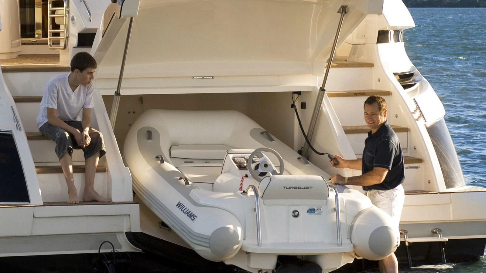 men on a boat aboard 6800 SPORT YACHT Yacht for Sale