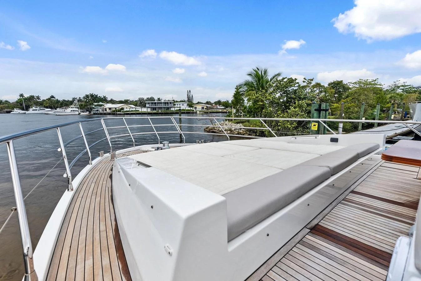 The foredeck features a spacious sunpad area with a beautiful view of the surrounding waters. aboard CLASS DISMISSED Yacht for Sale